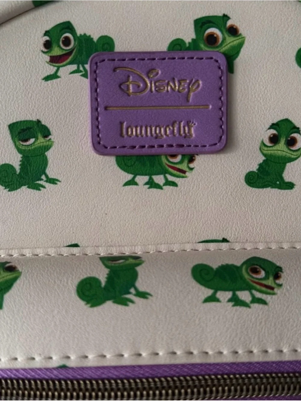 Disney Loungefly Tangled Mini Backpack with Green Pascal Print and Purple Trim